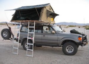 Land cruiser with a family Tent